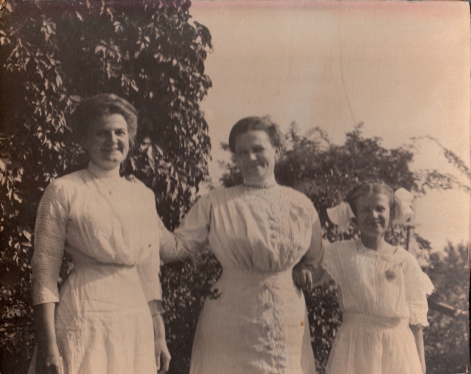 Martha and her daughters. From left to right: Edessa, Martha, and Helen.